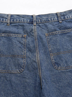 Carpenter denim bermuda shorts in medium wash with double-stitched back pockets.