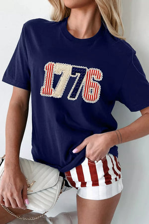 Navy cotton maternity t-shirt with patriotic 1776 appliqué and round neck.