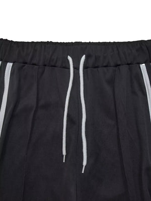Black wide-leg pants with drawstring and white side stripes