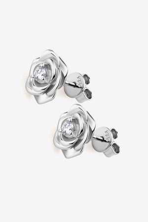 Silver rose stud earrings with a diamond center detail.