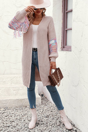 Dust Storm acrylic knit cardigan with colorful fringe sleeves and textured knit.