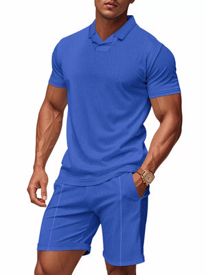 Men's sapphire blue waffle knit polo and jogger shorts set with a notched collar.