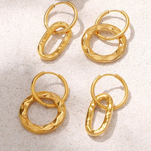 Textured gold vermeil hoop earrings with oval and circular charms.