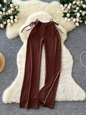Brown maternity wide-leg pants with tie waist and side slit detail