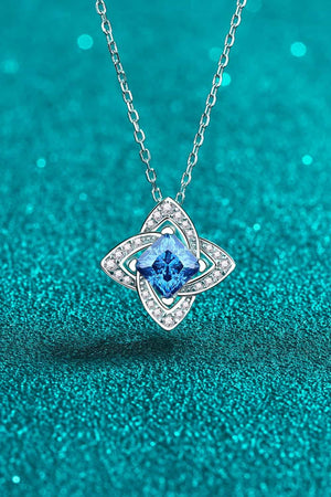 Sky blue moissanite and diamond pendant necklace with floral design