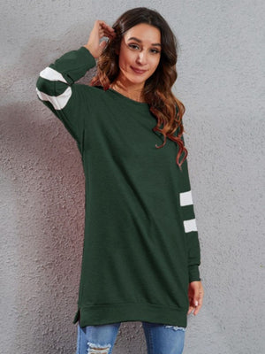 Dark green polyester sweatshirt dress with white varsity stripes on sleeves.