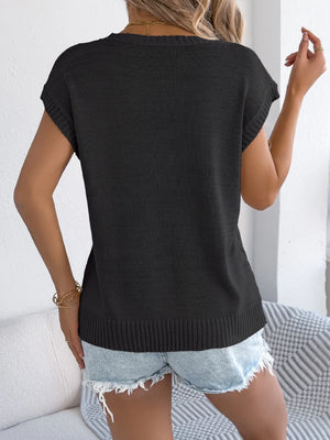 Black cable knit sleeveless crew top with ribbed hem and cuffs.