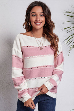 Blush pink and white striped off-shoulder knit sweater with perforated details.