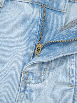 Light wash denim jeans with a zipper fly detail and visible stitching.