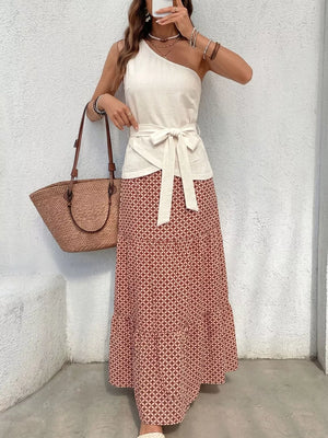 Cream one-shoulder top with tie waist and geometric print maxi skirt set
