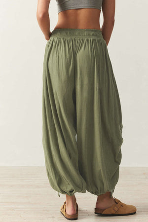 Matcha green gathered ankle-tie balloon trousers with elastic waist