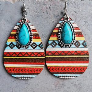 Geo-Turq Teardrop Dangle Earrings with tribal pattern and turquoise stone accent.