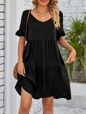 Black ruffled sleeve mini dress with tiered skirt and V-neck.