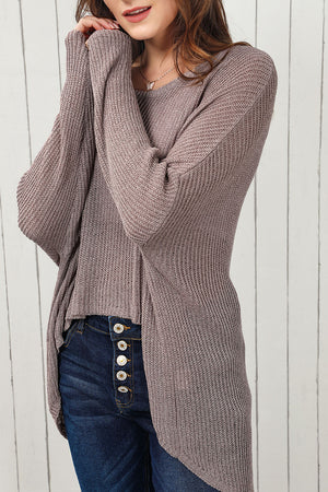 Asymmetric slouch knit top in mocha with a relaxed fit and open front.