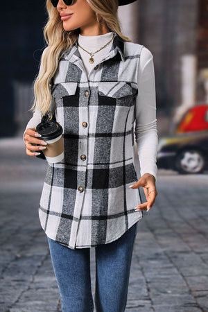 Plaid utility vest with patch pockets, button front, collared, sleeveless, gray and black plaid.