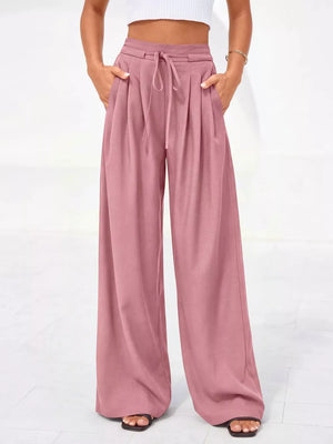 Dusty pink high-waisted pleated wide-leg pants with drawstring and pockets
