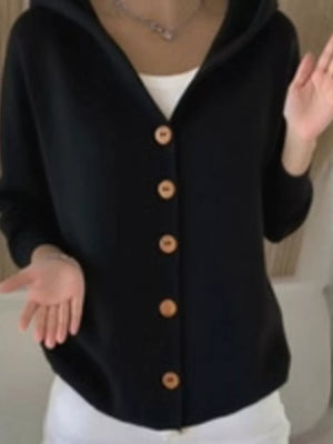 Black hooded knit cardigan with button-front detail and wooden buttons.