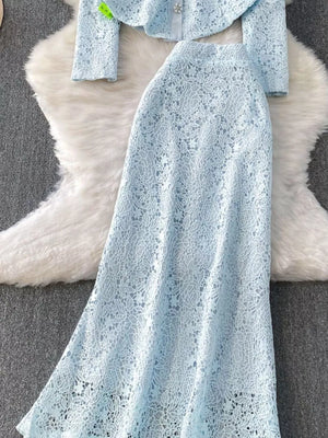 Light blue lace two-piece ensemble with peplum top and long skirt.