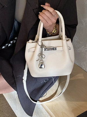 Leather Crossbody Bag With Lock Detail in White, side view