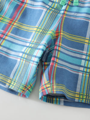 Toddler shorts in blue plaid cotton with a drawstring waist and colorful stripes.