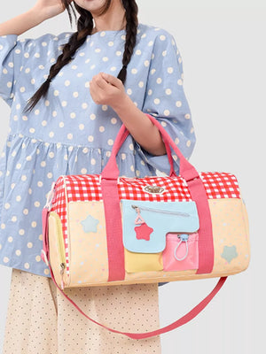 Charming gingham duffel bag with colorful star appliques and multiple pockets.