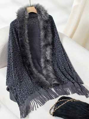 Grey leopard print acrylic cardigan with faux fur trim and fringe.