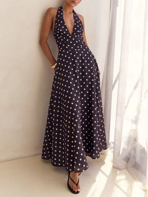 Navy polka dot halter neck maxi dress with a-line skirt