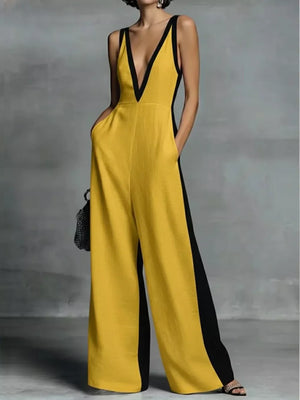 Yellow wide-leg jumpsuit with deep V-neck and black contrast trim, sleeveless, with pockets.