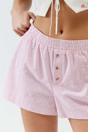 Pink seersucker boxer shorts with button fly and elastic waistband
