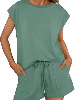 Green crew neck two-piece set with drawstring shorts and pockets