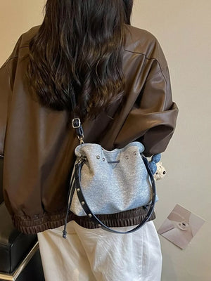 Bucket Crossbody Bag in Blue, side view