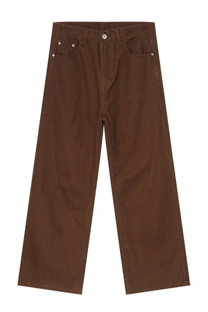 Brown wide-leg denim jeans with angled seams and a casual fit.