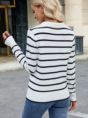 Polo-neck knit top with black and white Breton stripes, long sleeves, and ribbed cuffs.