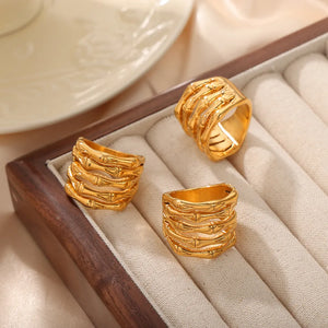 Gold sculptural titanium bamboo ring with stacked segmented design