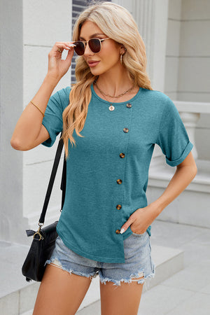 Teal asymmetric button-up tee with short sleeves and a rounded neckline.