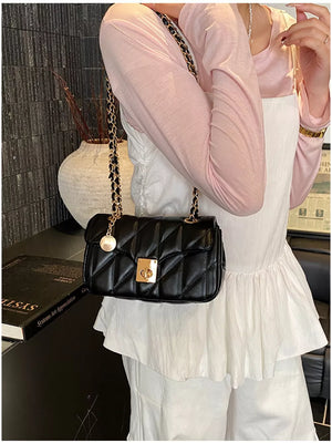 Quilted Chain Shoulder Bag in Black, model styling view