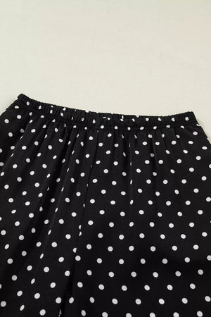 Black polka dot wide-leg maternity trousers with elastic waistband