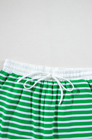 Green and white striped cotton loungewear shorts with elastic waistband and drawstring.