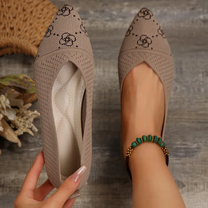 Khaki knit pointed ballet flats with floral pattern, featuring a cutout and quilted insole.