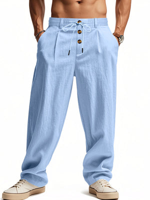 Men's light blue drawstring loose fit sweatpants with button detail