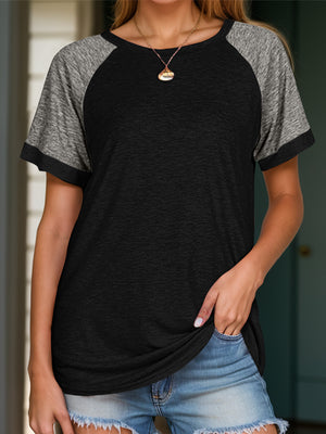 Raglan sleeve tee in black with heather gray sleeves and crew neck.