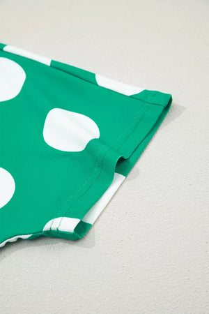 Green polka dot cropped tee detail showing hem and stitching