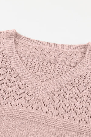 Dusty pink perforated knit V-neck pullover sweater with openwork detail.