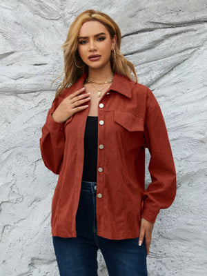 Textured corduroy button-up jacket in amber with chest pockets and silver buttons