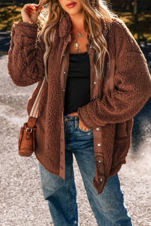 Brown teddy textured utility jacket with button front and contrast trim.