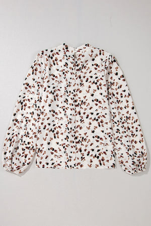 White abstract print blouse with high neck and balloon sleeves