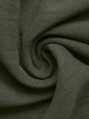 Button-down midi dress in olive green linen with a belted waist.