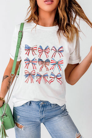 White patriotic bow print t-shirt with a crew neck and short sleeves.