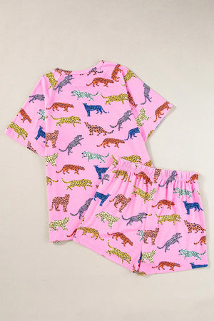Pink leopard print loungewear set with a short sleeve top and shorts.