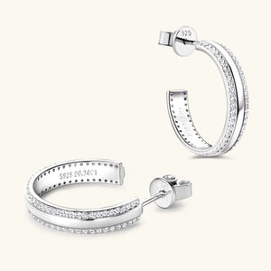 Silver pavé moissanite C-hoops in sterling silver with double row of stones.